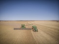 Agworld Row Crops for Growers. Combine harvestor wheat field harvesting.