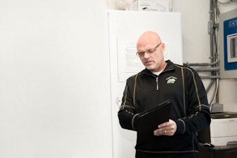 Agworld customer, Andrew Gladden from Luckey Farmers using Agworld Farm Management Software on iPad