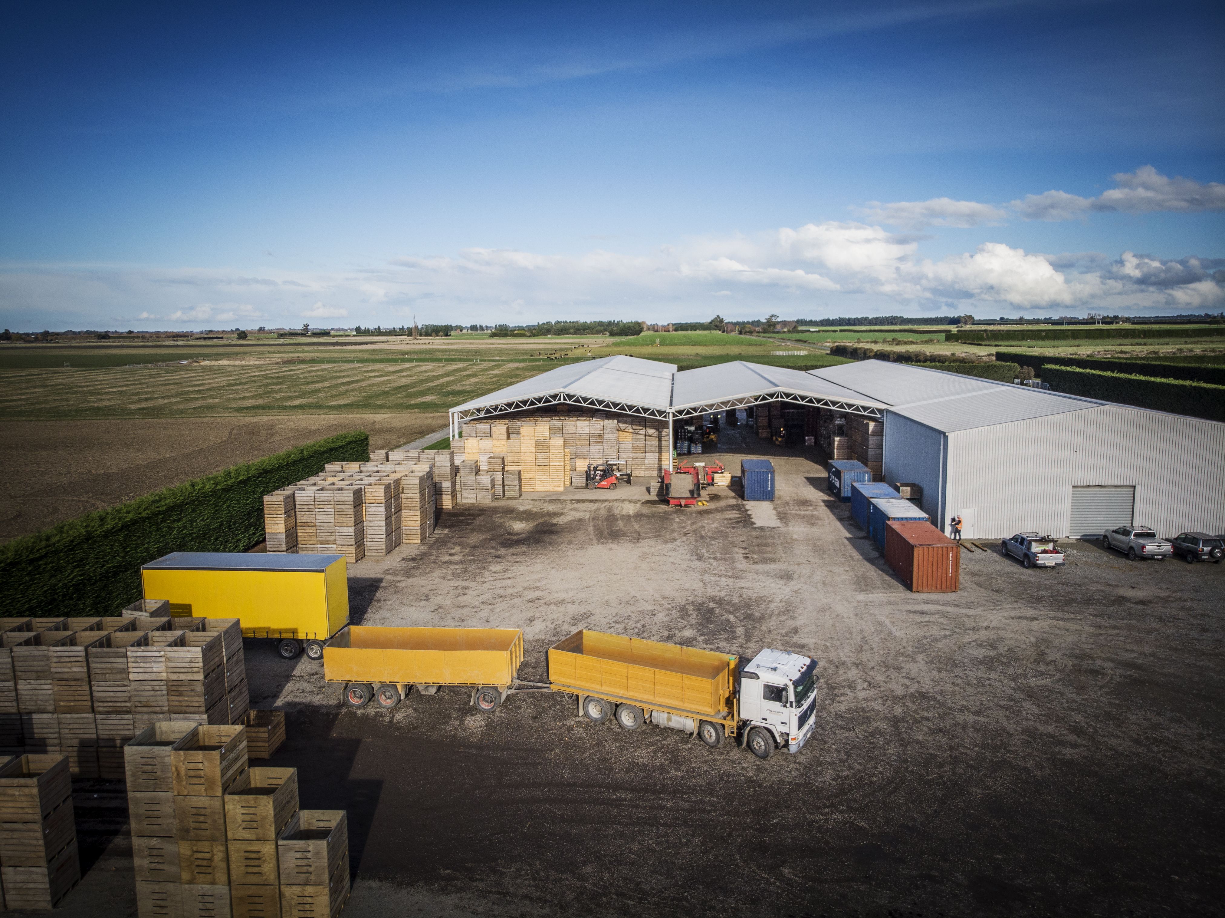 Agworld Farm Management Software customer Lynchris Farm, Leeston, NZ. Aerial view, buildings and transport