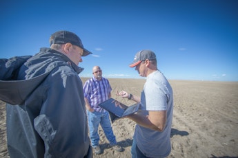 Agworld Farm Management Software customers: Luke Adams, Scott Freiburger in the field, Timm Adams Farms. Making informed decisions by using Agworld.